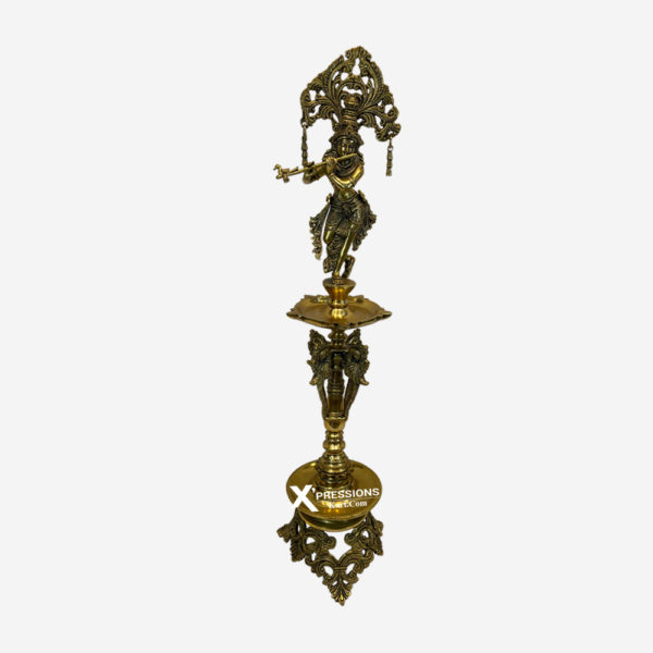 brass krishna idol