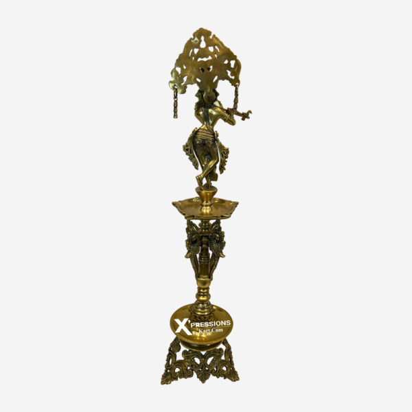 brass krishna idol